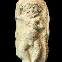 Mythlok - Humbaba stone carving